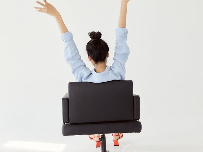 A sequence of yoga poses shown in a clean, bright space.